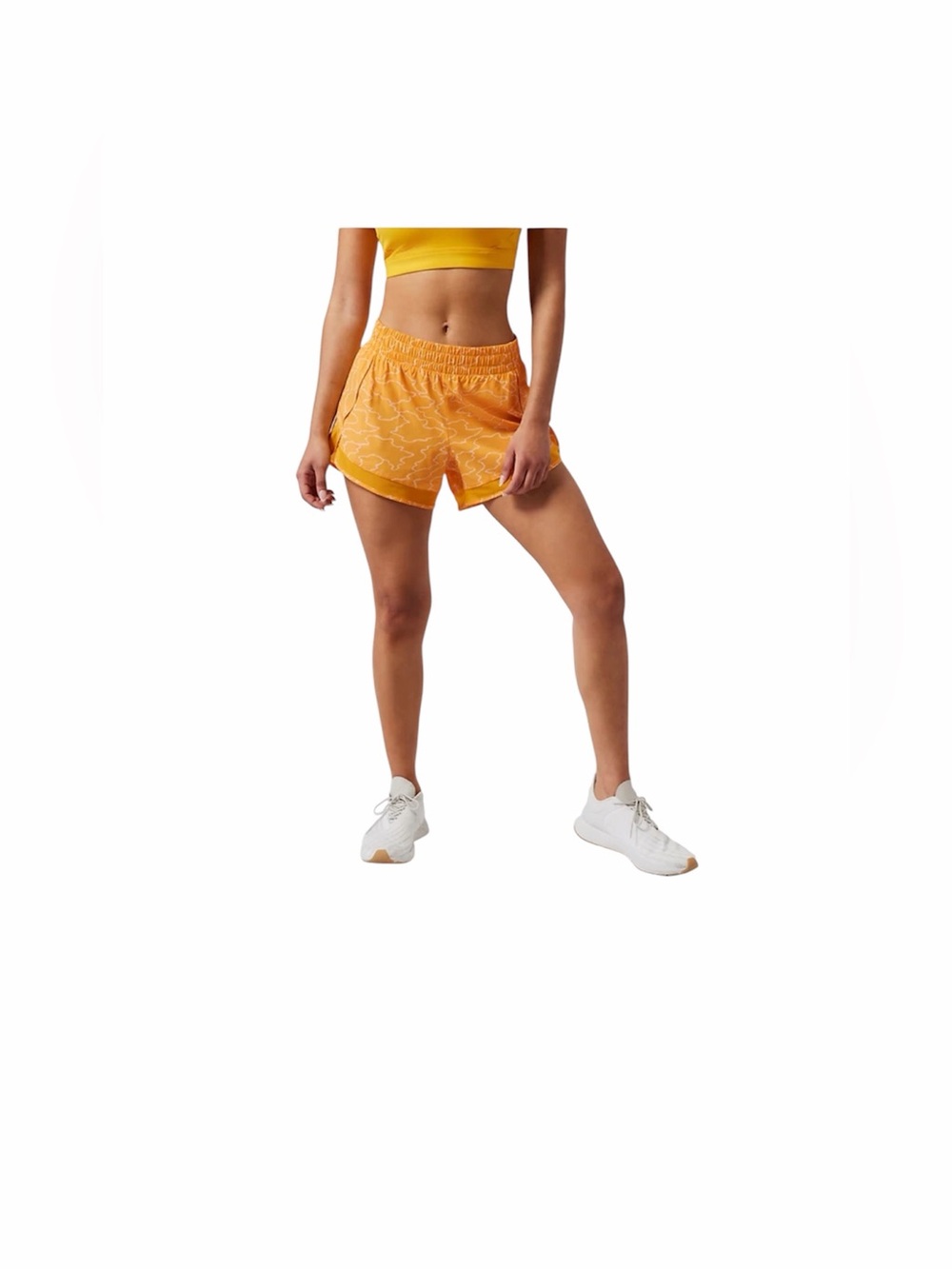 Athleta mustard geometric printed mesh racer run shorts 4” size small